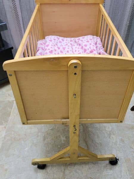 wooden baby cot with free mattress n mattress covers 4