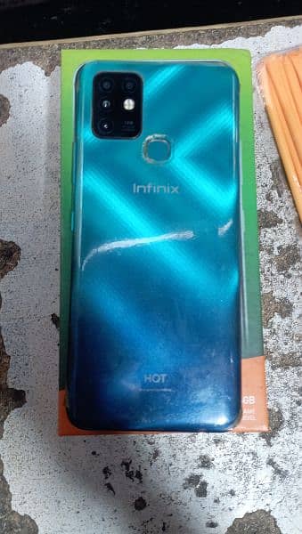 infinx hot 10.4/64 GB no open no reaper with box coundation. 10 by 10 1