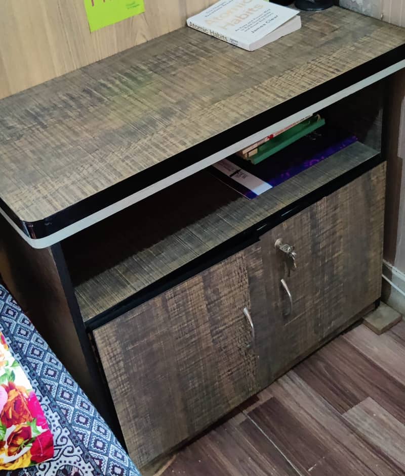 Made of fine Wood, with locked wide drawers. 2