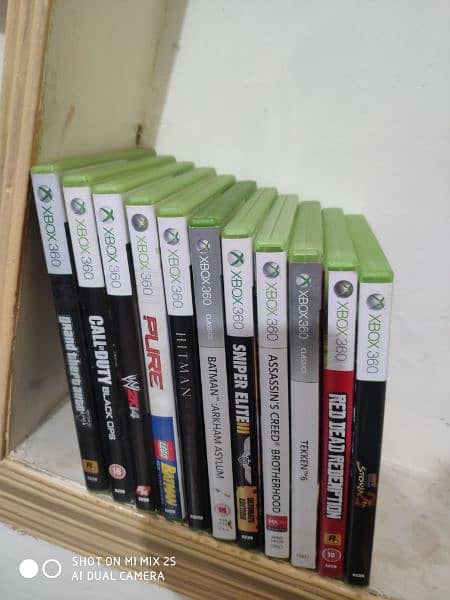 Xbox 360 with  Two control and 12 cd of Xbox360 all cd are organial 4