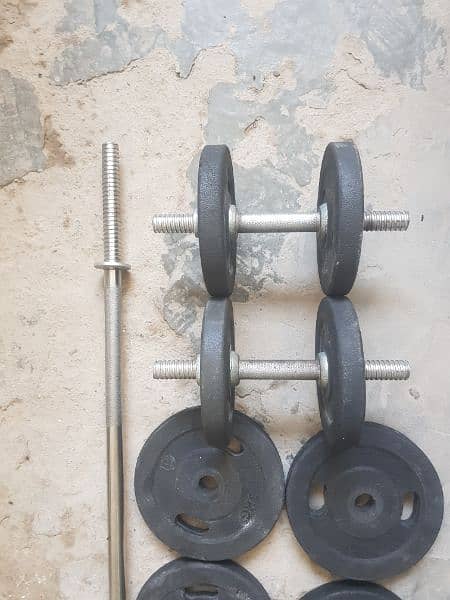 weight plates and dumbbell road 5