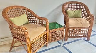 2 x Cane sofa Chairs and Table