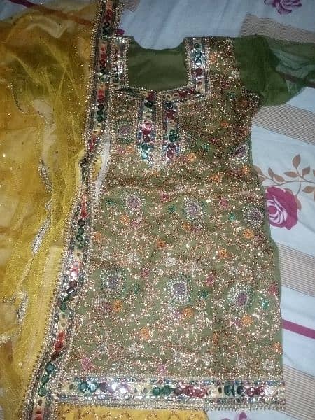 brodal mehandi dress fabric net full embroidry work condition 10/ 10 1