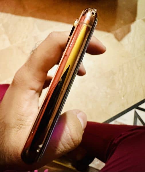 i phone Xs max Rose gold 64 gb Pta 7