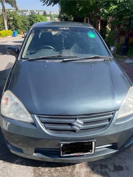 Suzuki Liana Neat and clean condition 1