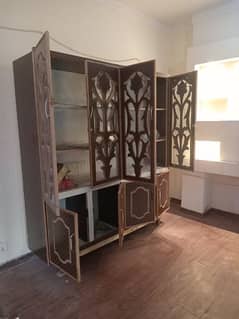 A beautiful hand carved cupboard for sale.