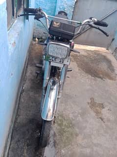 Honda 125 with all original tankie tape