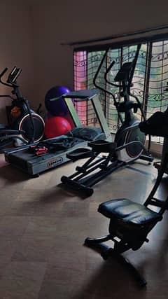 one elliptical one Tred mill without computer one abs machine 2 balls