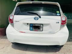 Toyota Aqua 2014 Model Urgent sale on my name ABS battrie 100% perfect