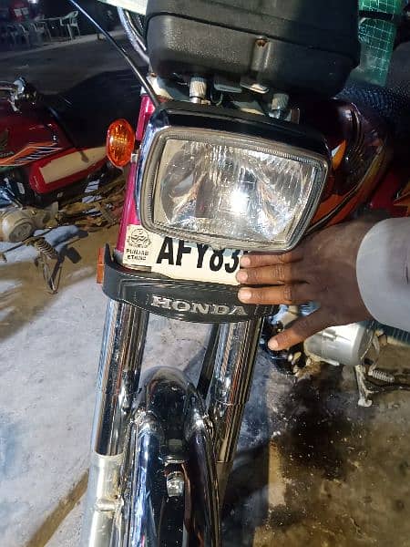 I am sale hond 125 good condition 1