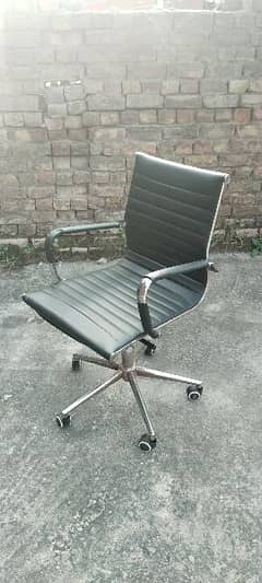 Double lever heavy duty revolving office chair.