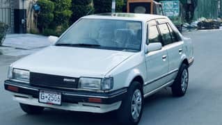 Mazda 323 totally original Mint condition urgent Sale