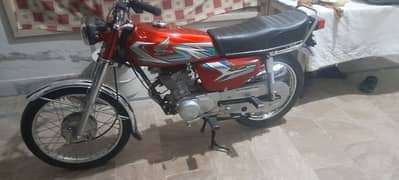 honda 125 Red colour  serial 556