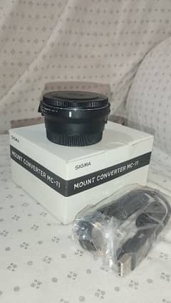 Sigma MC-11 Mount Converter. Adapt EF-Mount Lens to Sony E Body