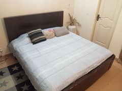 king size wooden bed with foam mattress