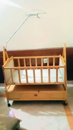 wooden Cot + moveable swing for sale 0