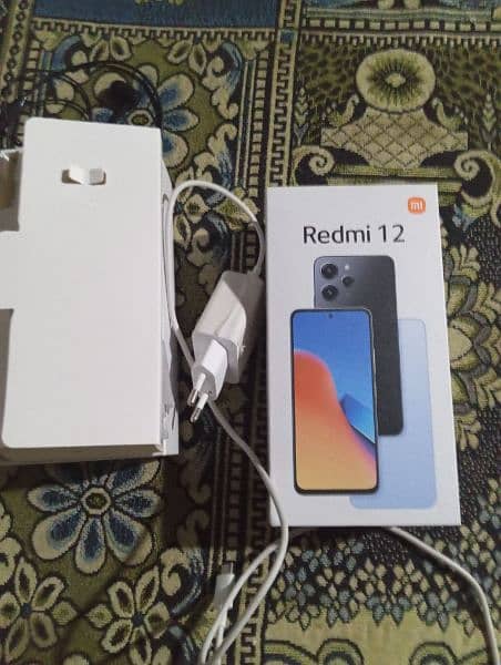 urgent sell redmi 12 condition 10/10 8+4/256 only 27 day used 4