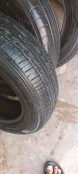 165/70_ 14 tyre han halat behtreen 2 penchar han bas 6