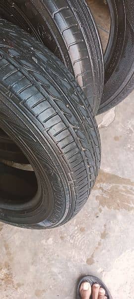 165/70_ 14 tyre han halat behtreen 2 penchar han bas 7