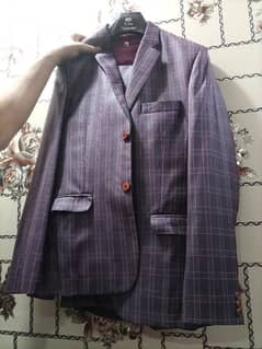 medium size purple colour 3 piece suit condition all good