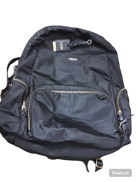 Black Tumi backpack! Worn but has a lot of life left! 1