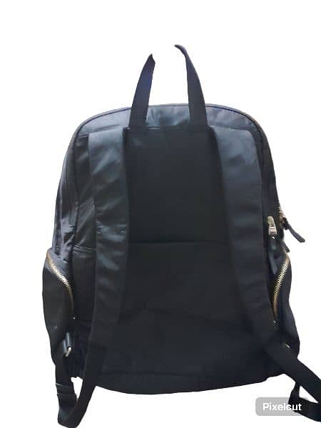 Black Tumi backpack! Worn but has a lot of life left! 3