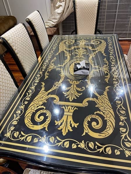 8 chairs luxury dining table with glossy base with glass 0