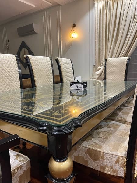 8 chairs luxury dining table with glossy base with glass 1