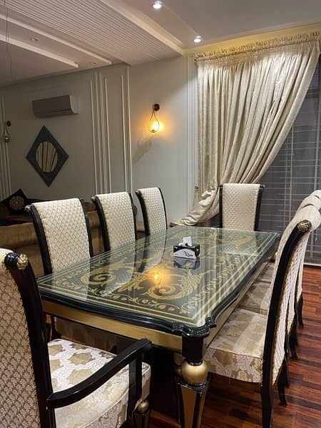 8 chairs luxury dining table with glossy base with glass 2