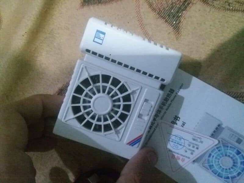 Original Air Conditioned Mobile Cooling Fan. 1