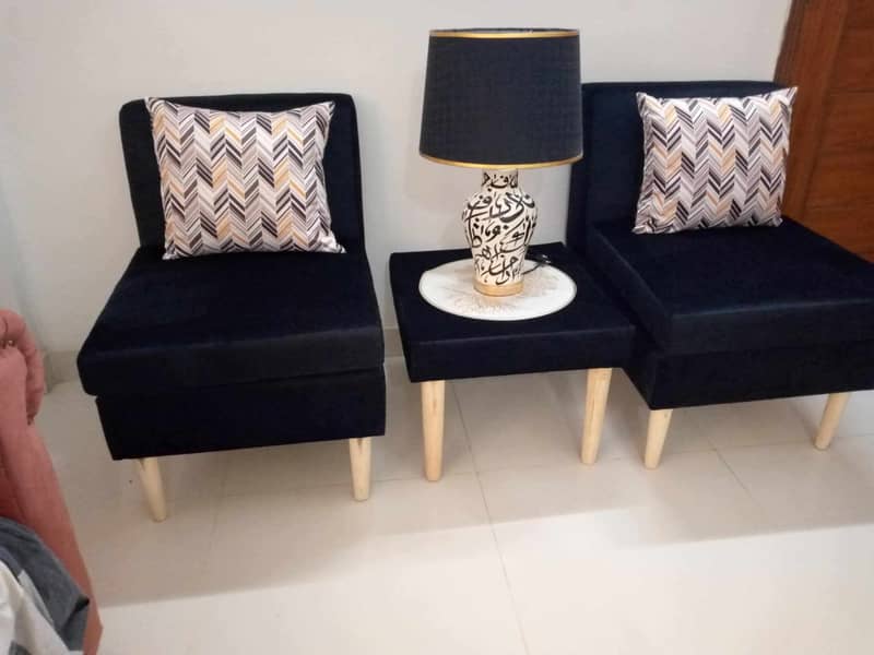 2 seater velvet sofa with table 2