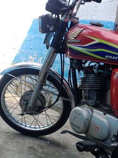 Honda 125 with all original tankie tape