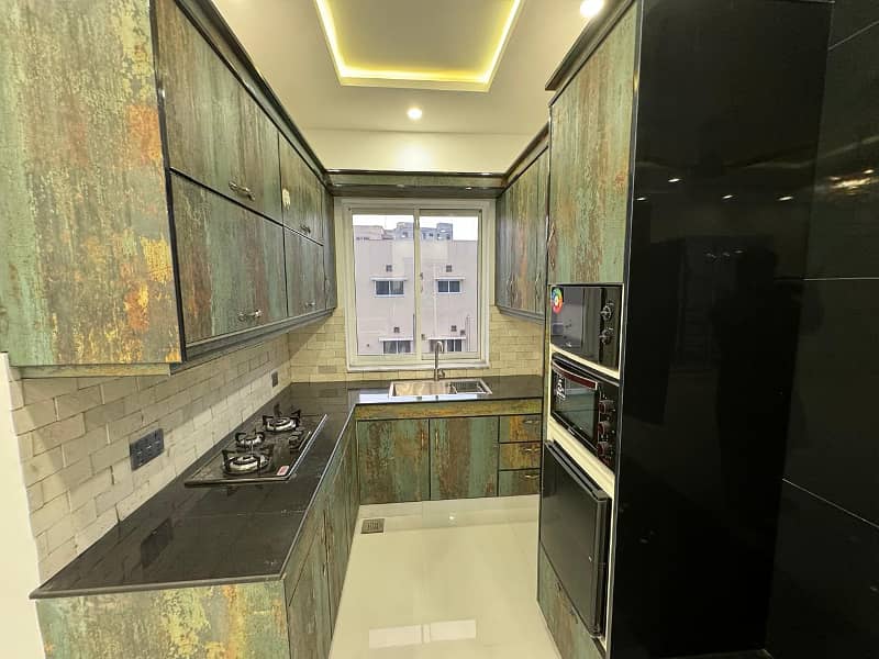 1 KANAL FULLY BASEMENT HOUSE FOR SALE IN TIPU BLOCK SECTOR F BAHRIA TOWN LAHORE 9