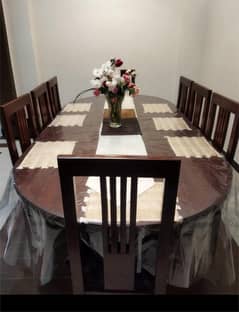 Dining table made of Sheesham wood.