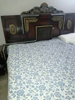 Bed with side tables and dressing table