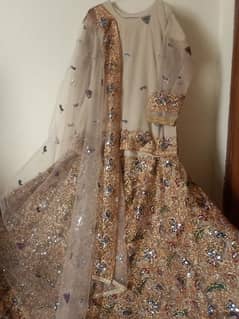 A 3 pc fancy Hand made lehnga with shirt & embroided dupatta for girls