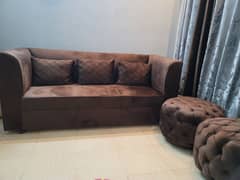 3 seater sofa and 2 ottomans