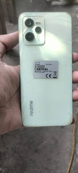 I am selling my home realme c35 with box and original charger 0