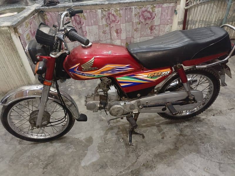 Honda 70 2020 model red colour 03160464389 1