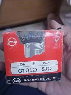 Kawasaki 125 piston with piston ring