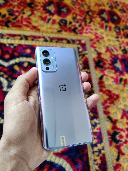 OnePlus 9 5g 12/256 with charger  dual SIM approved 1