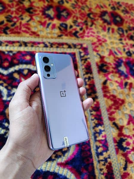 OnePlus 9 5g 12/256 with charger  dual SIM approved 7