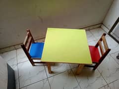 Colorful Wooden Kids Study Table with Two Chairs in Great Condition 0