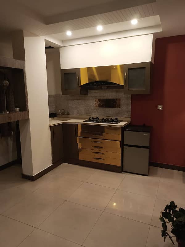 1BED STUDIO FURNISHED APORTMENT IS AVAILABLE FOR RENT IN SECTOR B BAHRIA TOWN LAHORE 2