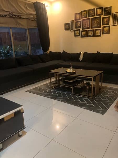 11 seater comfortable and elegant black sofa 0