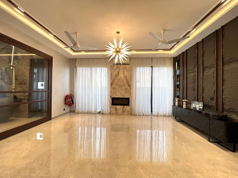 "Exclusive 1 Kanal Semi-Furnished 5 Bed Home with Basement in DHA Phase 6" 1