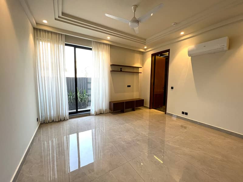 "Exclusive 1 Kanal Semi-Furnished 5 Bed Home with Basement in DHA Phase 6" 13