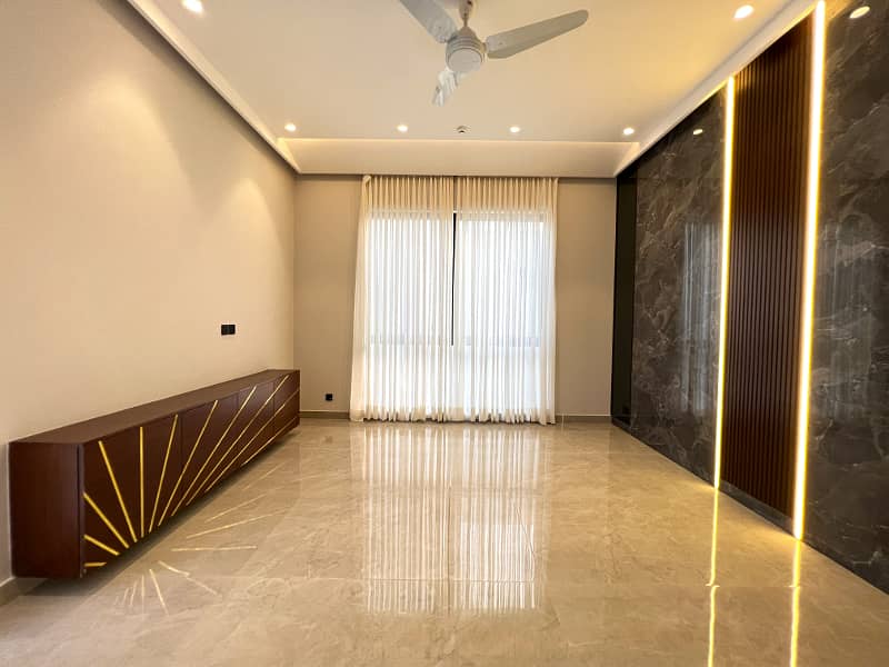 "Exclusive 1 Kanal Semi-Furnished 5 Bed Home with Basement in DHA Phase 6" 17