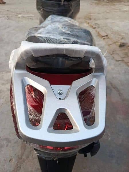 united 100cc self start scooty 2024 1