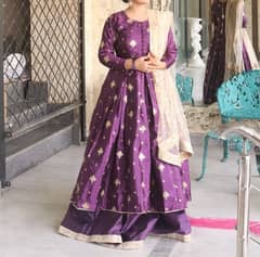 An embroidered frock with lehnga